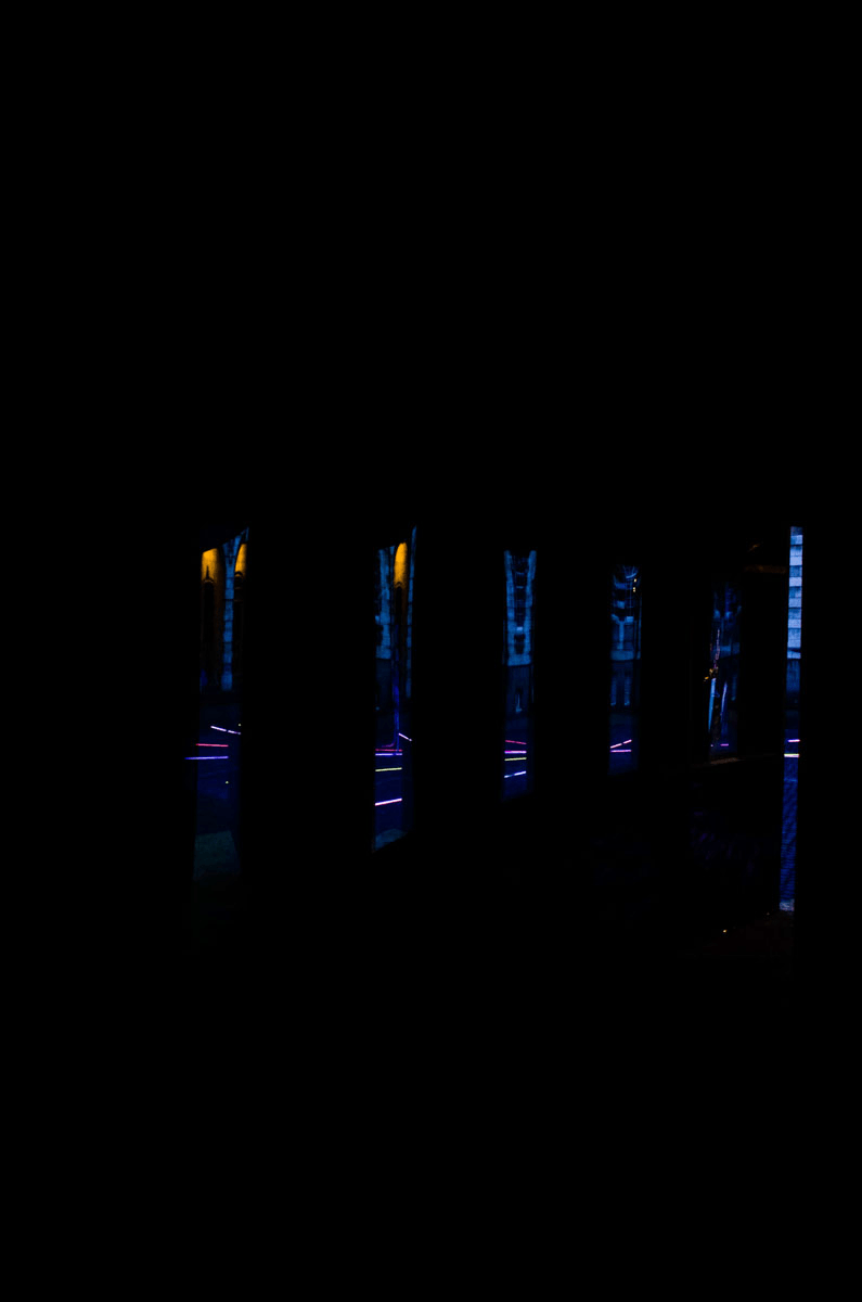 Inside Anta Germane public artwork Interactive Tunnel looking out through one way perspex mirror at night, situated in London Rootstein Hopkins Parade Ground.